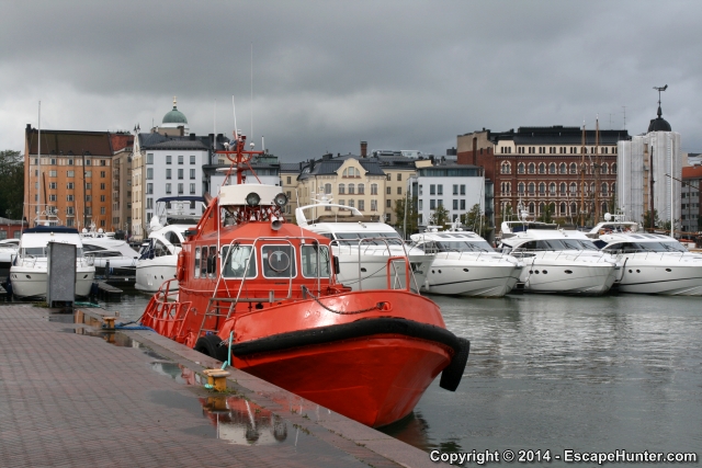 Red boat with white boats