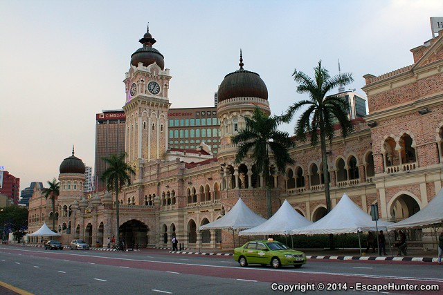 Green taxi near the Merdeka Square