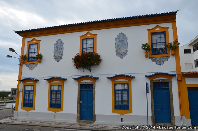 Blue, yellow, white building
