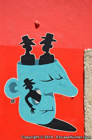 Red wall with street art