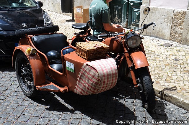Brown old motorcycle with sidecar